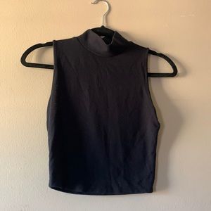 Black turtle neck sleeveless crop top